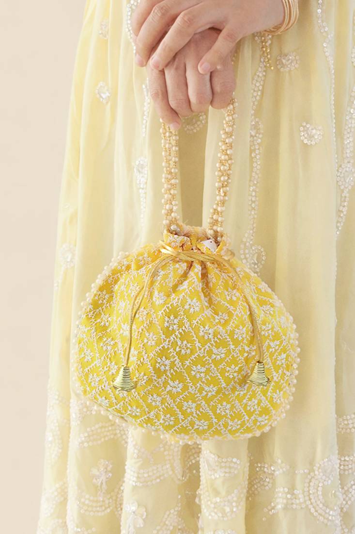 Yellow embroidered potli bags – handcrafted wedding potli with beads  