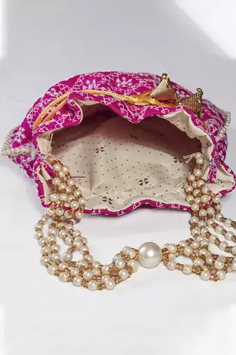 Rani embroidered potli bags handcrafted wedding potli with beads 