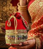 Red silk designer potli bag – golden embroidery & pearl handle