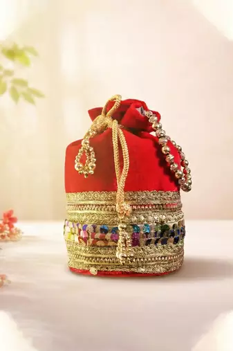 Red silk designer potli bag – golden embroidery & pearl handle