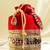 Red silk designer potli bag – golden embroidery & pearl handle