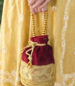 Maroon silk designer potli bag with golden embroidery and pearl handle