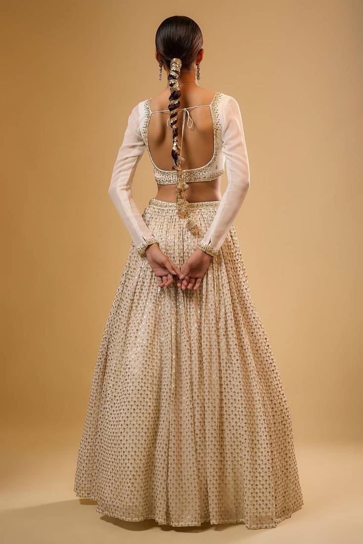 WHITE EMBROIDERED GEORGETTE FLAIRED LEHENGA CHOLI WITH DUPATTA