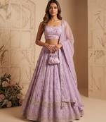 LAVENDER EMBROIDERED GEORGETTE FLAIRED LEHENGA CHOLI WITH DUPATTA
