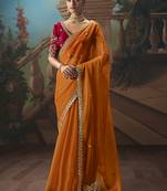 Orange fancy fabric saree with embroidered work