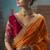 Orange fancy fabric saree with embroidered work