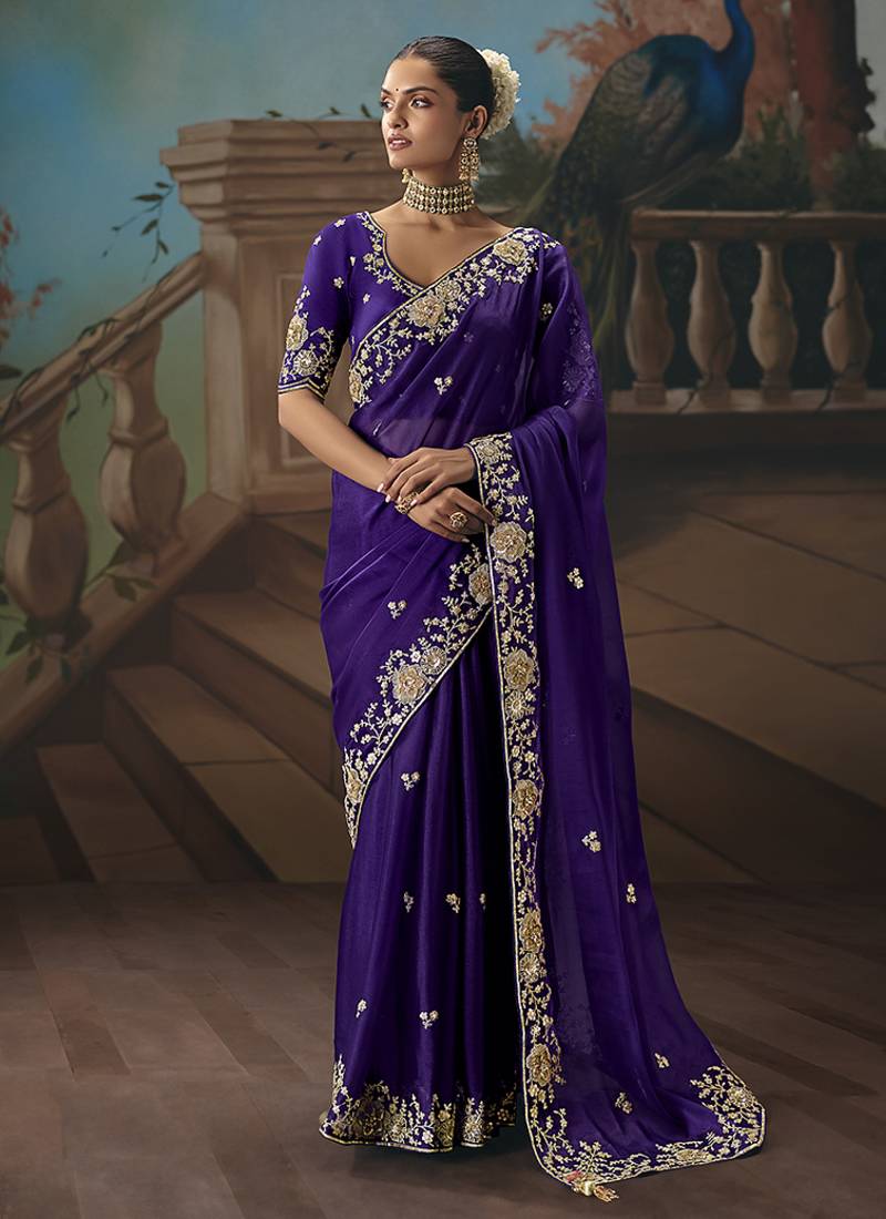 Purple fancy fabric saree with embroidered work