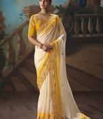 Cream fancy fabric saree with embroidered work