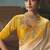 Cream fancy fabric saree with embroidered work