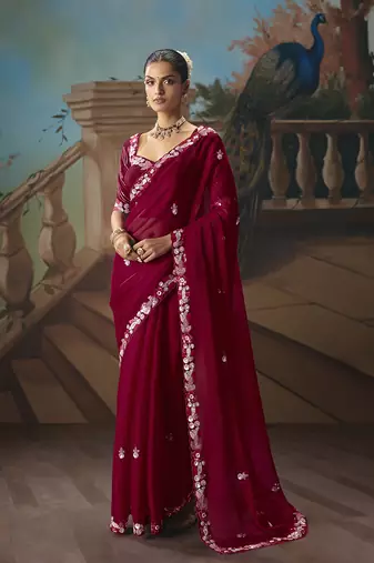 Maroon fancy fabric saree with embroidered work