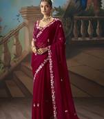 Maroon fancy fabric saree with embroidered work