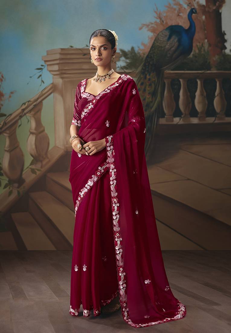Maroon fancy fabric saree with embroidered work