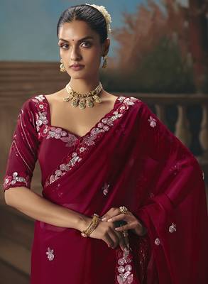 Maroon fancy fabric saree with embroidered work 2