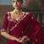 Maroon fancy fabric saree with embroidered work