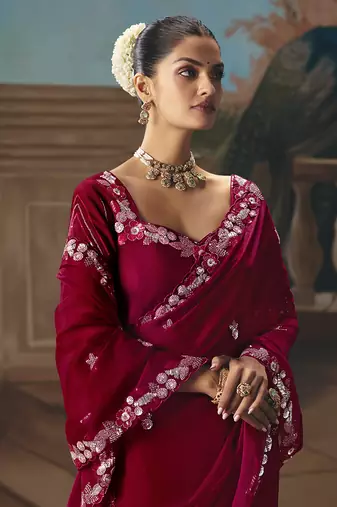 Maroon fancy fabric saree with embroidered work