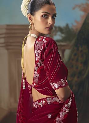 Maroon fancy fabric saree with embroidered work 4