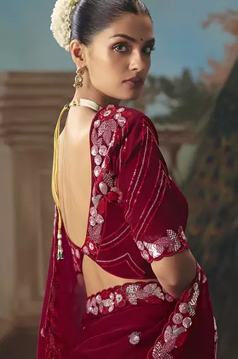 Maroon fancy fabric saree with embroidered work