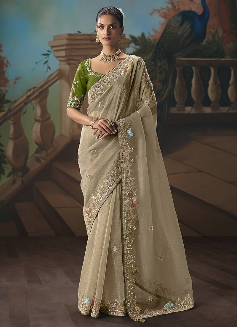 Beige fancy fabric saree with embroidered work