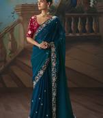 Teal blue fancy fabric saree with embroidered work