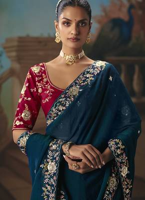 Teal blue fancy fabric saree with embroidered work 2