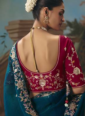 Teal blue fancy fabric saree with embroidered work 3