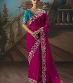 Rani pink fancy fabric saree with embroidered work