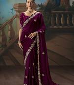 Wine fancy fabric saree with embroidered work