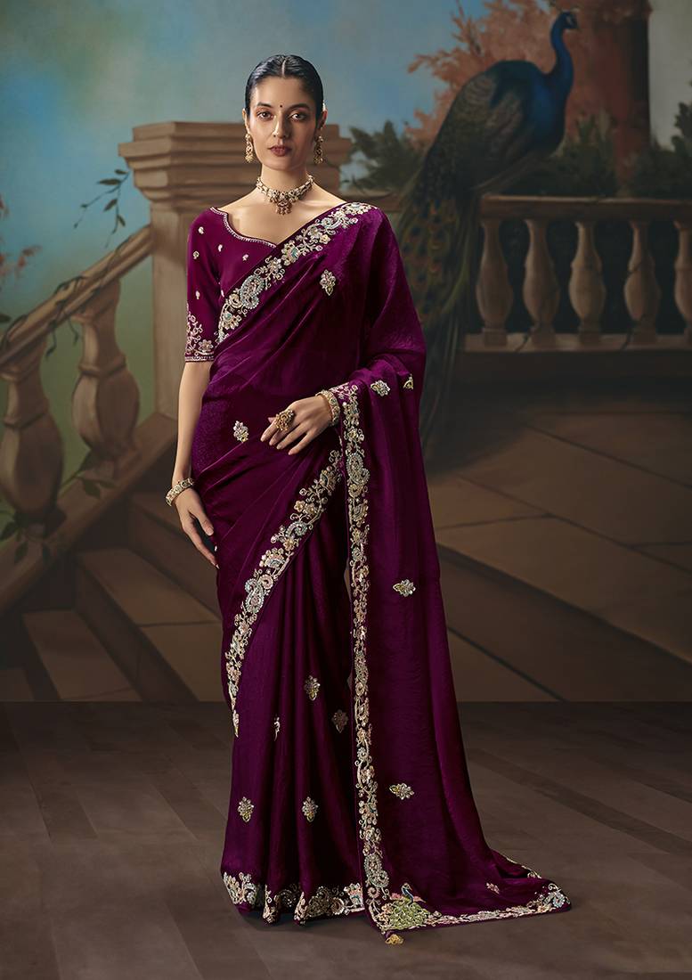 Wine fancy fabric saree with embroidered work