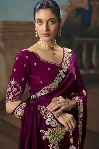 Wine fancy fabric saree with embroidered work