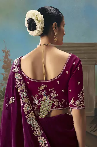 Wine fancy fabric saree with embroidered work