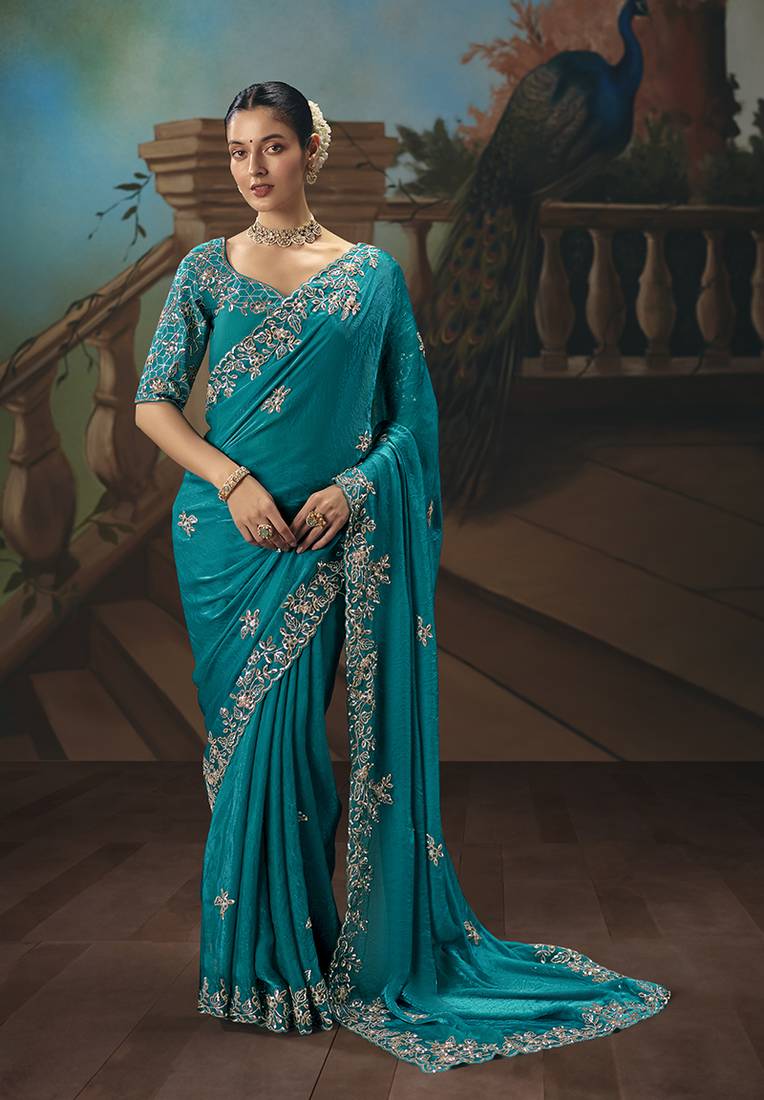 Aqua blue fancy fabric saree with embroidered work
