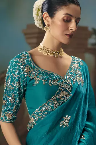 Aqua blue fancy fabric saree with embroidered work