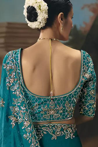 Aqua blue fancy fabric saree with embroidered work