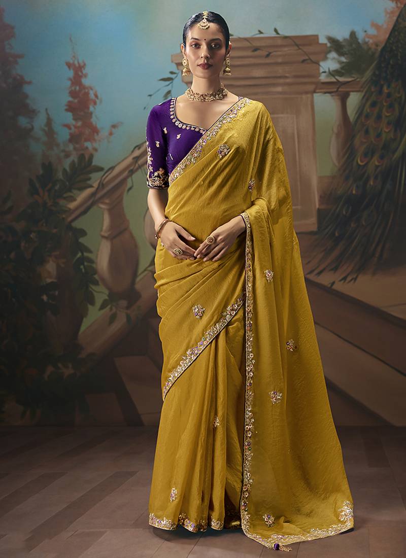 Mustard fancy fabric saree with embroidered work