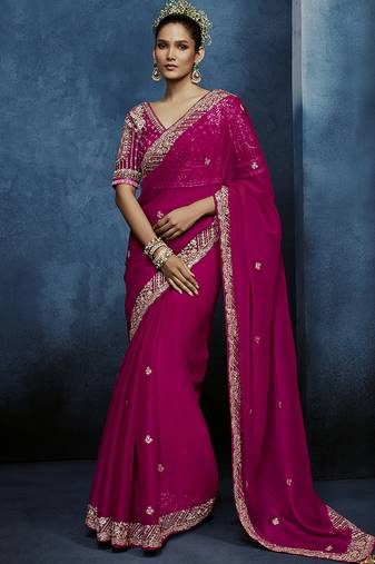 Rani pink fancy fabric embroidered saree with stiched blouse