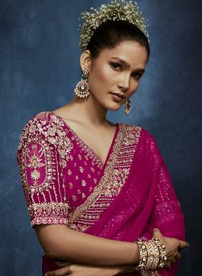 Rani pink fancy fabric embroidered saree with stiched blouse 2