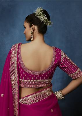 Rani pink fancy fabric embroidered saree with stiched blouse 3