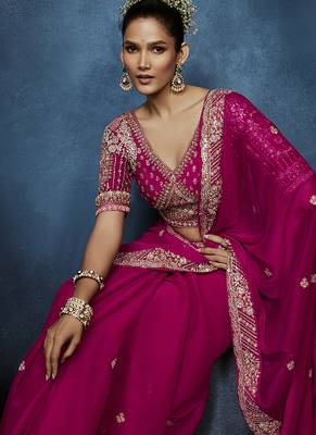Rani pink fancy fabric embroidered saree with stiched blouse 4