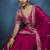 Rani pink fancy fabric embroidered saree with stiched blouse