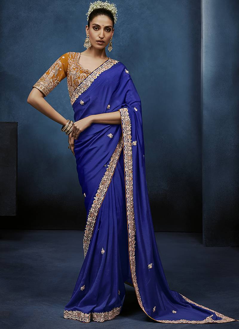 Royal blue fancy fabric embroidered saree with stiched blouse