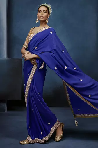 Royal blue fancy fabric embroidered saree with stiched blouse