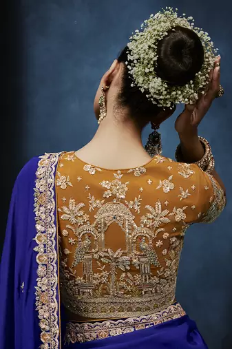 Royal blue fancy fabric embroidered saree with stiched blouse