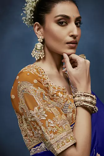 Royal blue fancy fabric embroidered saree with stiched blouse