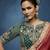 Rust fancy fabric embroidered saree with stiched blouse