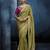 Light green fancy fabric embroidered saree with stiched blouse