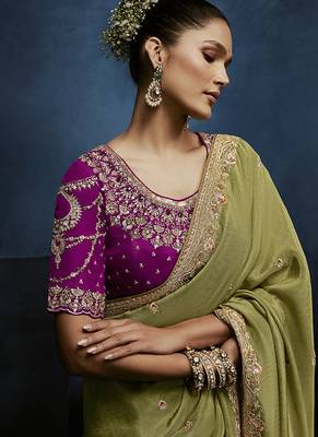 Light green fancy fabric embroidered saree with stiched blouse 2