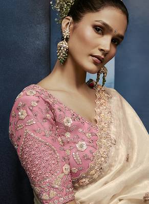 Cream fancy fabric embroidered saree with stiched blouse 2