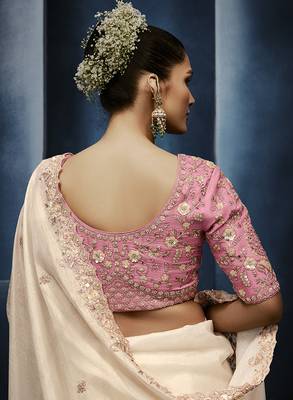 Cream fancy fabric embroidered saree with stiched blouse 4