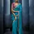 Aqua blue fancy fabric embroidered saree with stiched blouse