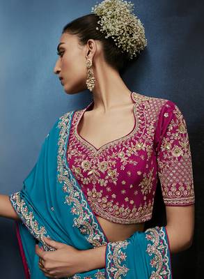 Aqua blue fancy fabric embroidered saree with stiched blouse 2